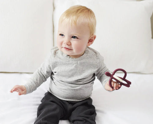 baby with matchstick monkey